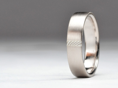 Platinum and Gold Wedding Rings with Inlay